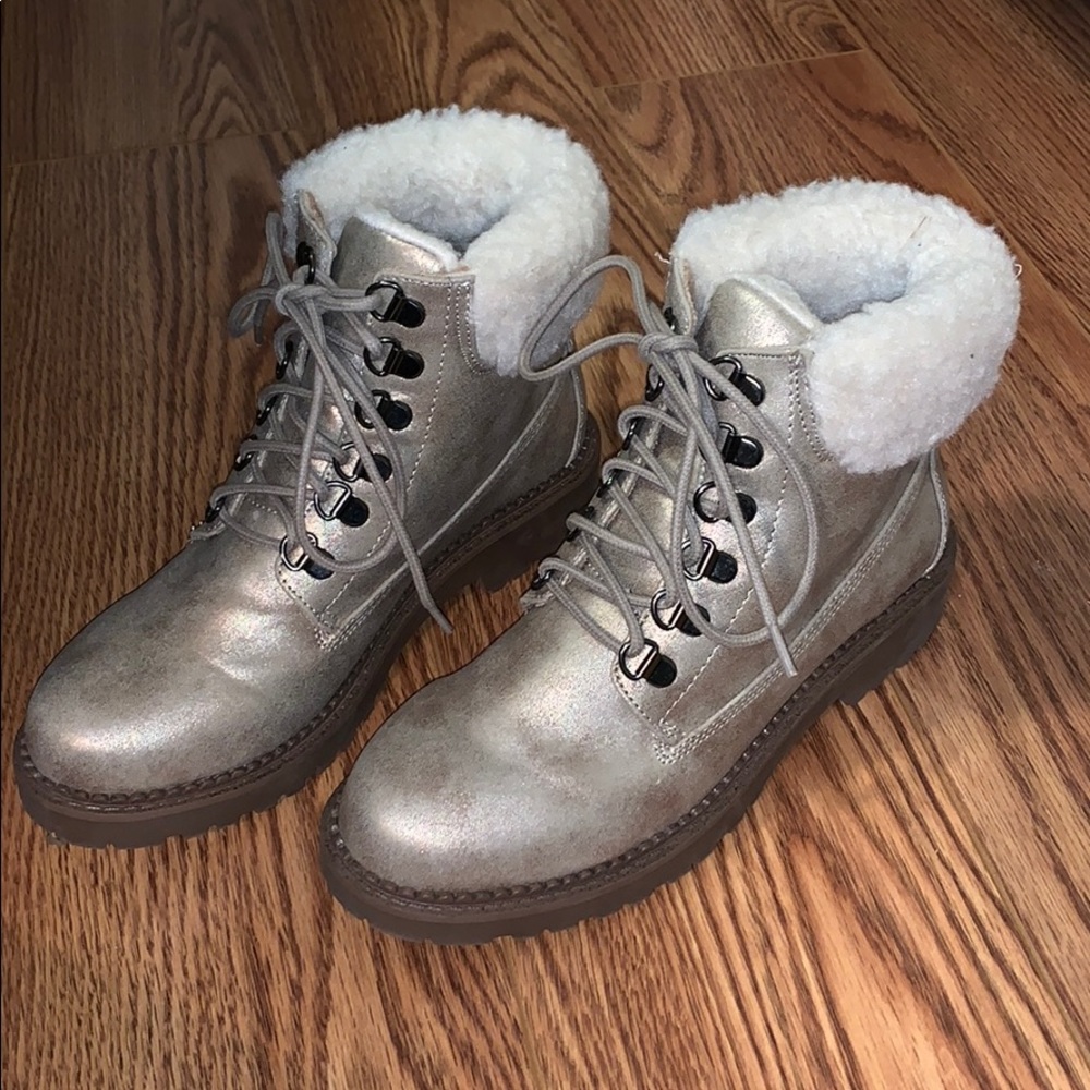 Shiny gold fur-lined combat boots